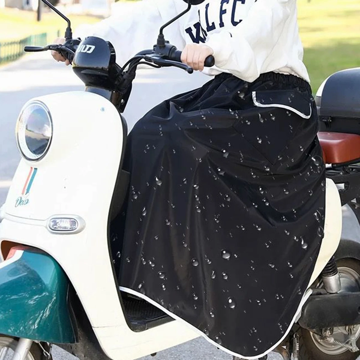 غطاء ساق للدراجات النارية والس - مراجعة Electric Scooter Rain Cover وسعره